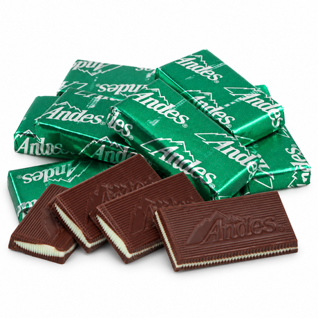 Andes mints in green foil wrappers with unwrapped chocolate mint layers
