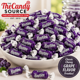 Pile of individually wrapped Tootsie Frooties Grape chewy candies