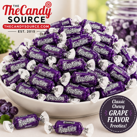 Pile of individually wrapped Tootsie Frooties Grape chewy candies