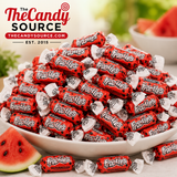 Pile of individually wrapped Tootsie Frooties Watermelon chewy candies