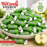 Pile of individually wrapped Tootsie Frooties Green Apple chewy candies
